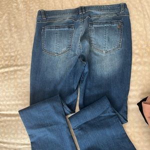 Bootcut and stretchy - flattering in the rear